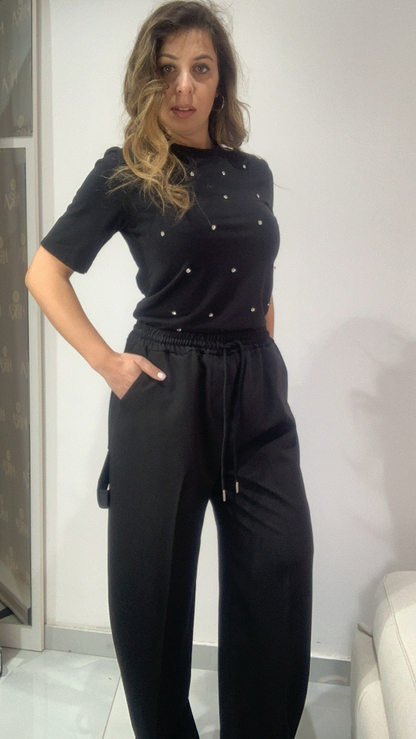Pantalone a palazzo con tasconi