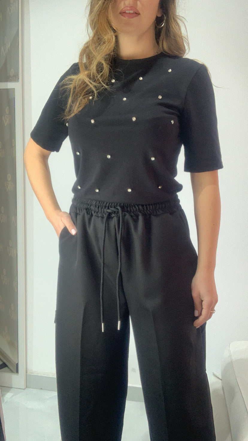 Pantalone a palazzo con tasconi