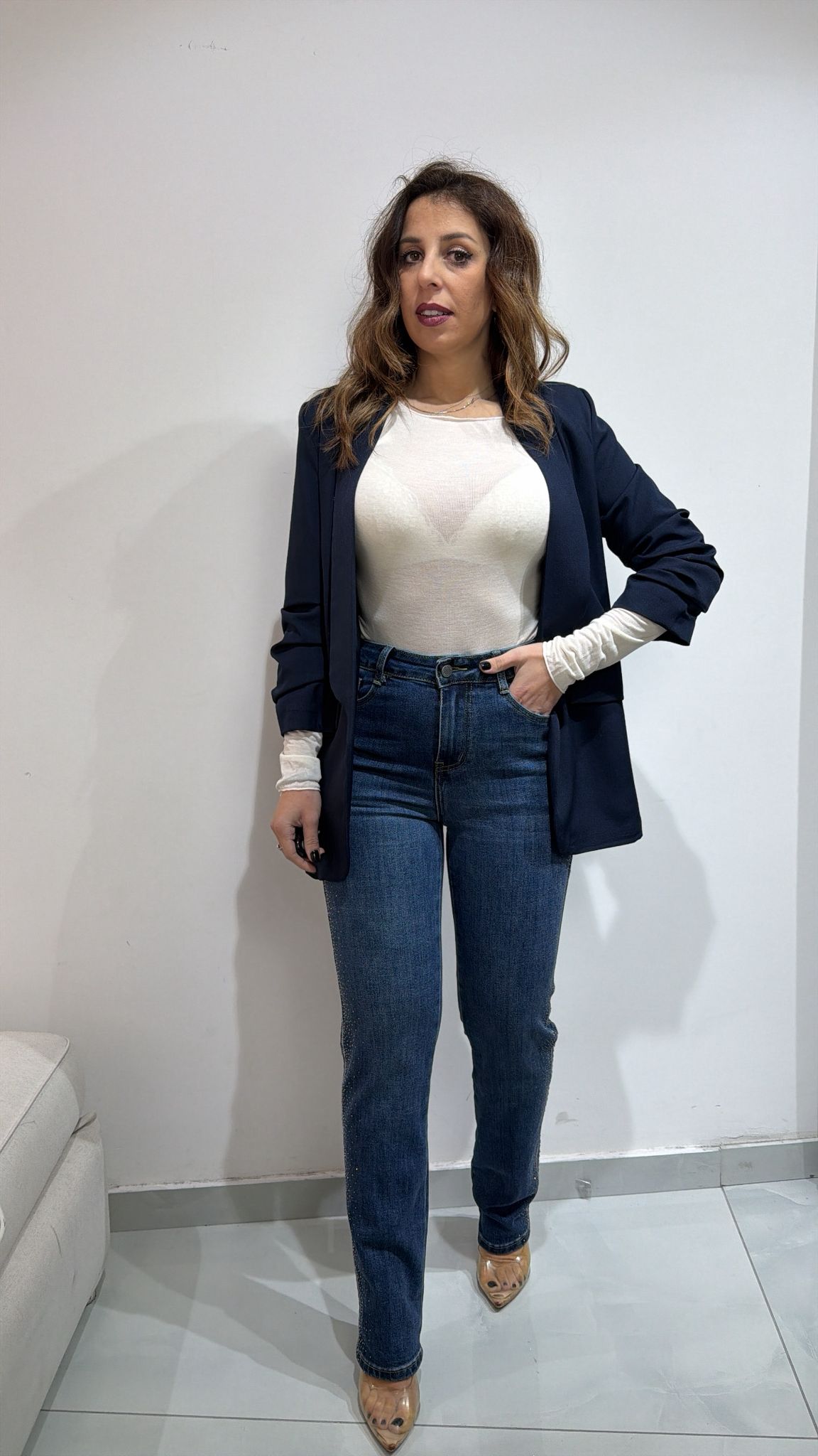 Jeans con fasce di strass