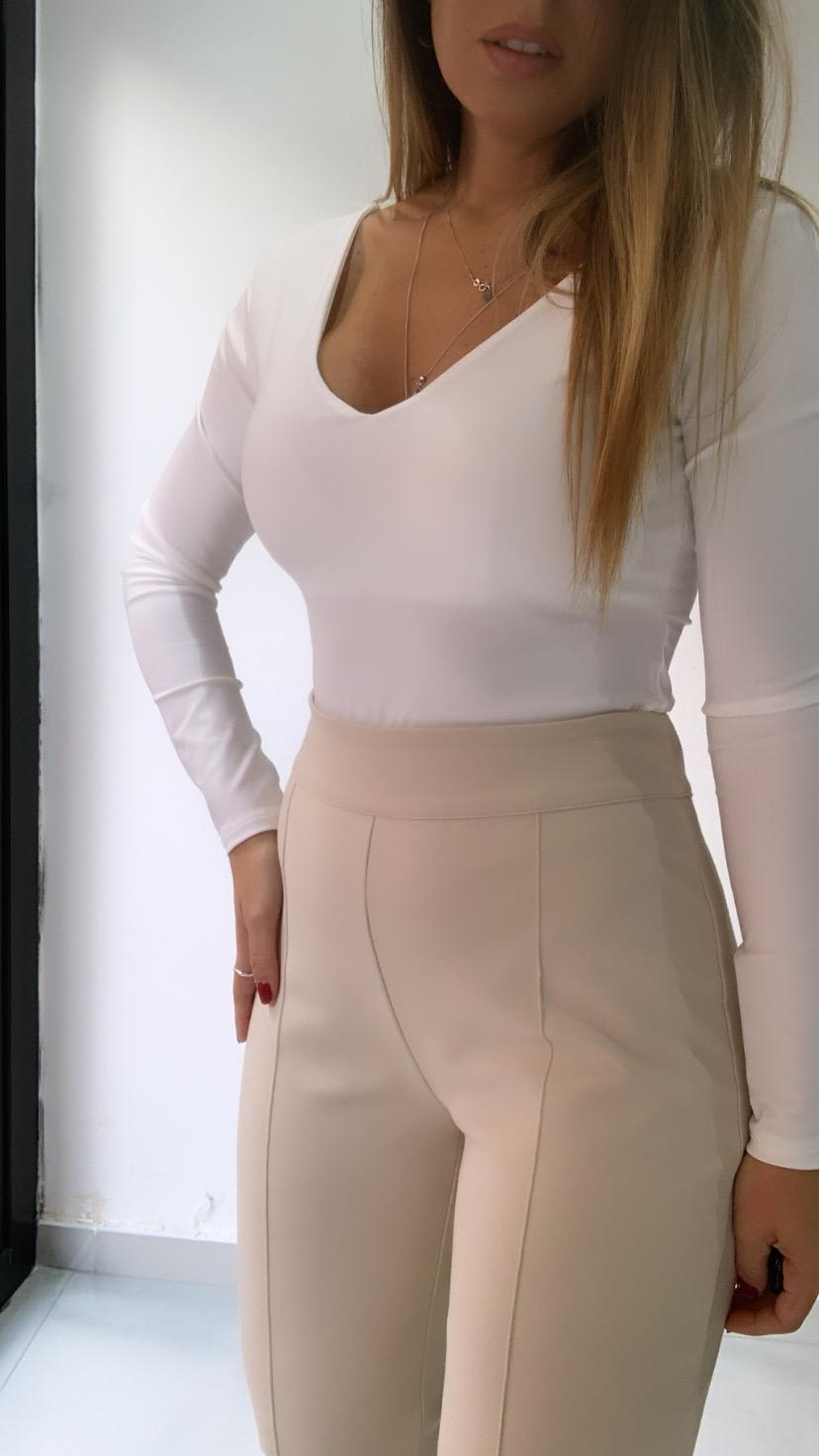 pantalone con cuciture a rilievo